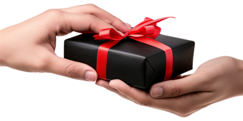 Close up of hands giving a black gift box with red ribbon to another person on a transparent background for Black Friday sales or celebration events.
