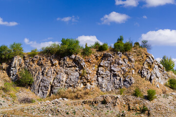 An old, currently unused quarry. A place where limestone was mined. Ostrov u Macochy village, South Moravia, Czech Republic.