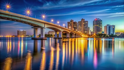 Obraz premium Sarasota Florida skyline and bridge at night low angle view