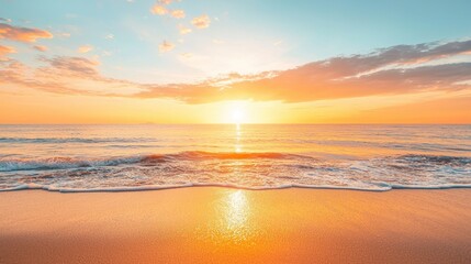 Fototapeta premium Golden Sunset Over the Ocean with Waves and Sandy Beach