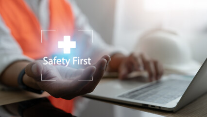 safety concept Industry regulations and standards For standard work processes and zero accidents Engineer touches safety icon on virtual screen