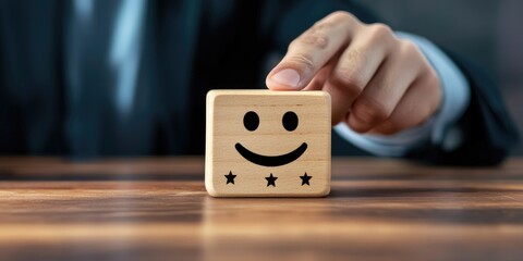 best excellent business services rating customer experience. Satisfaction survey concept. Hand of a businessman chooses a smiley face on wood block cube. 5 Star Satisfact