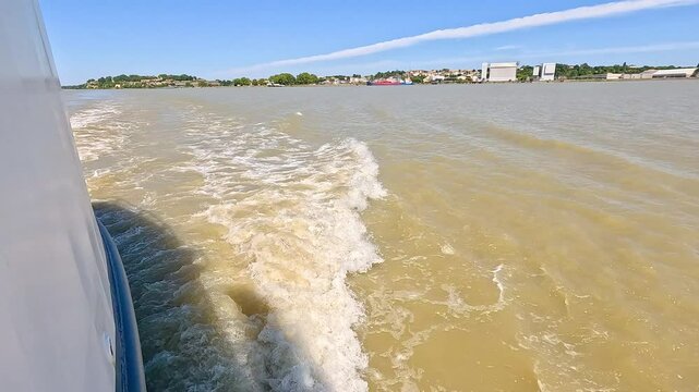 Boat Creating Waves on River