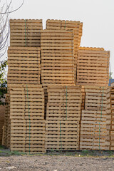 Stacks of wood pallets in a factory
