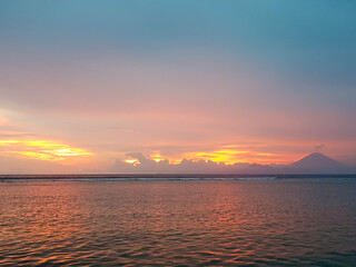 sunset over the sea with clouds