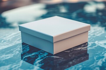 White Square Box on Marble Tabletop with Reflection