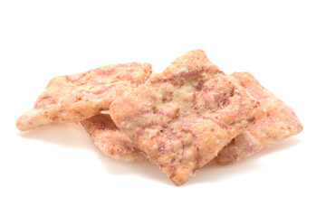 Cereal breakfast of crunched toast muesli with sugar closed up food background