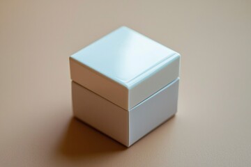 Obraz premium White Square Box on Beige Surface