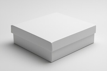 Fototapeta premium A Plain White Cardboard Box Isolated on a White Background