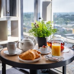 breakfast with croissant and coffee
