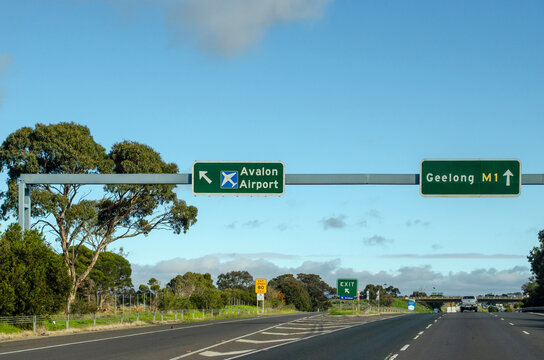 A highway with signs indicating the directions to Avalon Airport and Geelong. Victoria, Australia. Avalon Airport is a domestic airport located outside the Melbourne metropolitan area