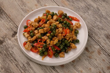 Saute tempeh and leunca. Tumis leunca tempe. Solanum nigrum, the European black nightshade or simply black nightshade or blackberry nightshade.