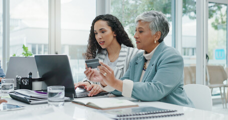 Office, team and women at laptop with credit card, budget planning and ecommerce research. Banking,...