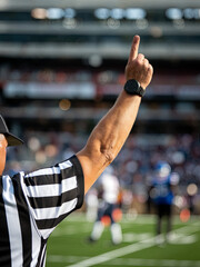 Referee signaling a touchdown