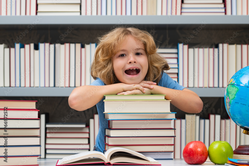 Aufkleber Excited pupil. School boy with stack of books in library. Nerd school kid. Clever child from elementary school with book. Smart genius intelligence kid ready to learn. Hard study.