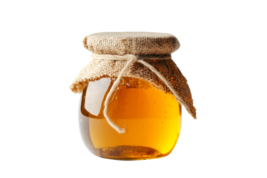 Natural honey in a jar that highlights honeycomb isolated on white transparent background, ideal for food lovers and health conscious themes