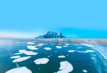 Beautiful clear ice with cracks on the Lake Baikal -  Clean, cool ice and cleanest lake in the world - Siberia, Russia