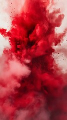 Red paint explosion against white background, dynamic art concept