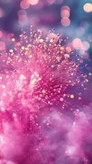Pink fireworks illuminate the night sky, creating a dazzling display.