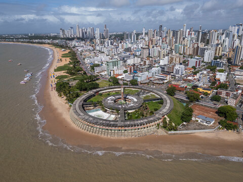 Beautiful aerial view to abandoned round hotel building by the ocean