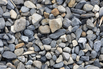 Pebbles in a flower border in a garden