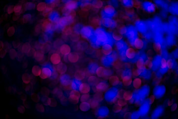 Colorful glitter lights background. Defocused bokeh. Lights texture. Blurred boke light background. Abstract bokeh background. Art design. Bright glowing bokeh background.