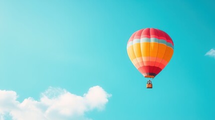 Obraz premium A hot air balloon gracefully navigating the sky, showcasing a slower, but equally captivating form of travel.