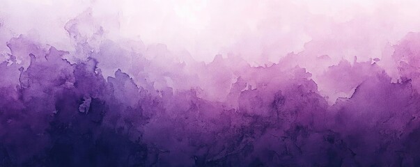 Obraz premium A beautiful abstract watercolor background featuring vibrant shades of purple and pink, perfect for artistic projects.