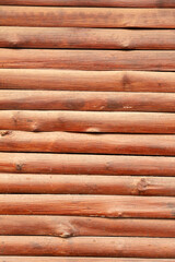 Wooden log house as an abstract background. Texture