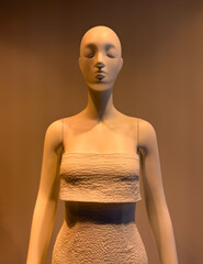 A girl's mannequin on display in a market
