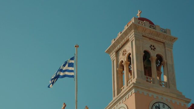 Greek flag next to an Orthodox church, Tinos island, Cyclades