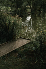 Fototapeta premium wooden bridge on a fishing pond. Corby