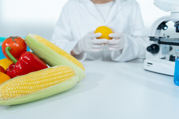 Scientist check chemical food residues in laboratory. Control experts inspect quality of fruits,...