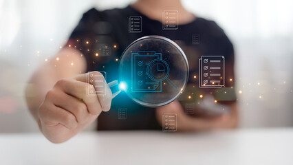 Hand holding a magnifying glass, showing the Audit Document concept, quality assessment management With a checklist, business document evaluation process, market data report analysis, and consulting
