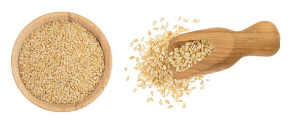 Sesame seeds in wooden bowl and scoop isolated on white background. Top view. Flat lay
