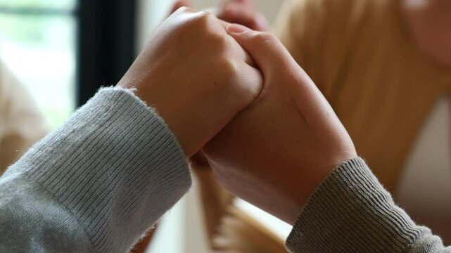 Group of people praying. Christian worship and pray. Christian group of people holding hands praying worships together to believe