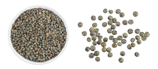 raw french green lentils in ceramic bowl isolated on white background. Top view. Flat lay