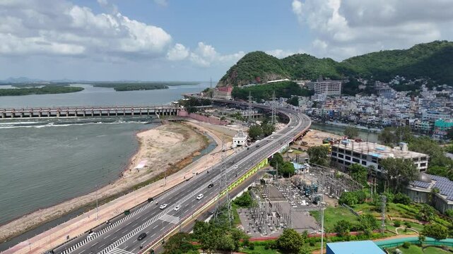 Aerial footage of Vijayawada, near the state capital of Andhra Pradesh, India, shows Amaravati. It is located in the center of the state in the Guntur district. Krishna river drone view.