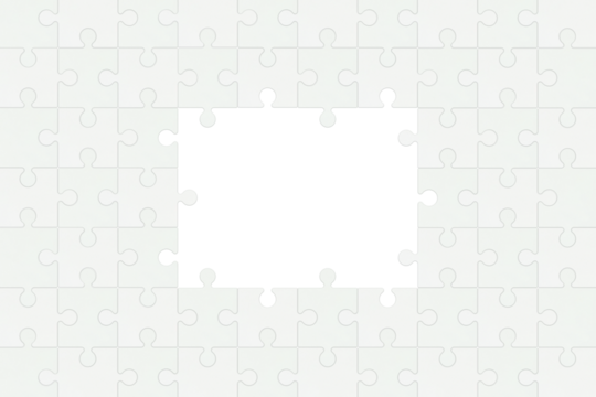 白い無地のジグソーパズルに囲まれた四角いフレーム