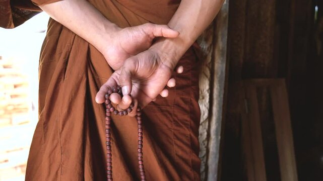 Buddhist Monk make merit and Meditation in ancient temple at Mandaley, Myanmar