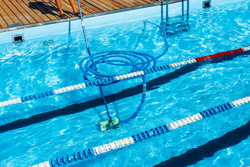 Cleaning of swimming pools. High quality photo.