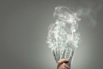 Dollar Bills Evaporate Into Smoke