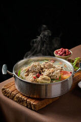 Hotpot made of copper pots, Chinese specialties, interior dark tone scene