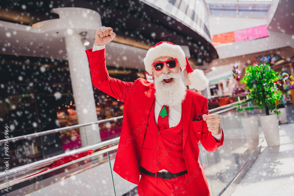 Sticker Portrait of attractive cheerful Santa rejoicing having fun festal day christmastime luck at shopping mall indoors