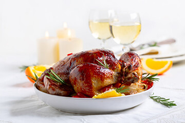 Whole roasted chicken close up.