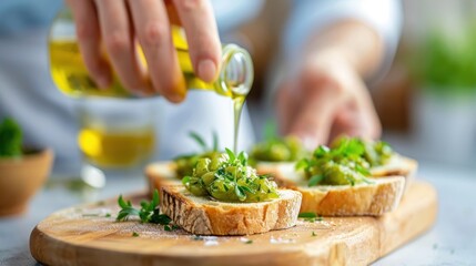 Green bean jam spread on warm toasted bread, with fresh herbs and a drizzle of olive oil around.