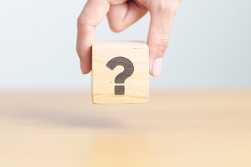 Wood block of Questions Mark ( ? ) sign. FAQ, frequency asked questions, Answer, Q and A,...
