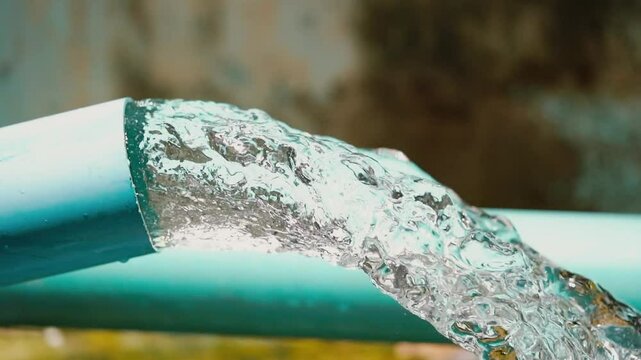 Water  from the water pump pipe.Slow motion water filtration