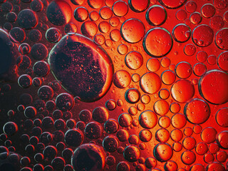 Abstract Background Red oil Macro Colorful artistic of oil drop floating on the water. macro red bubble oil of wallpeper, fizzyness bubble concept
