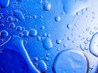 Bubbles on blue background. Abstract oxygen bubble water in sea sponge on blue background.Blue...